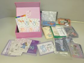 A collection of Japanese Disney 100 cards and Pokemon tattoos