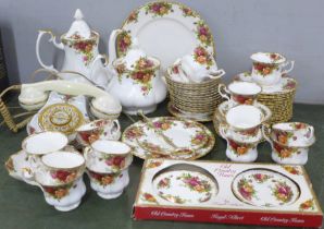 A Royal Albert Old Country Roses tea and coffee set, telephone, cake stand, etc., two cups a/f **