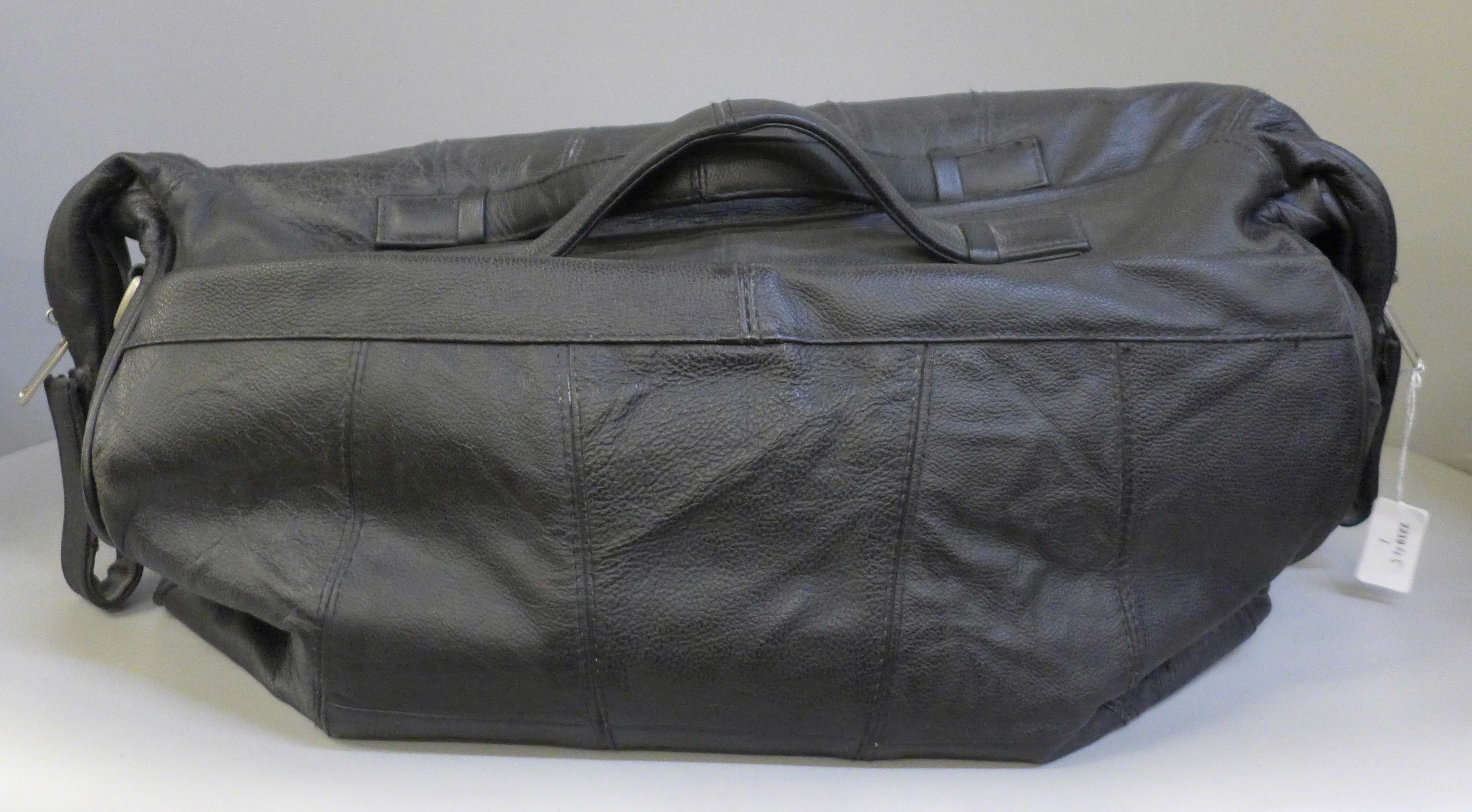 A black leather weekend bag
