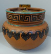 A Victorian terracotta tobacco jar