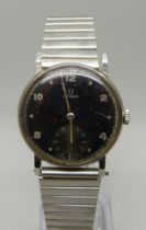 A gentleman's black faced Omega wristwatch with subsidiary second hand, 31mm case