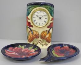 A Moorcroft Anna Lily mantel clock and two Anemone pin dishes