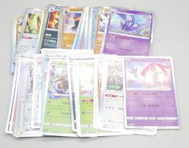 Fifty rare hologographic Japanese Pokemon cards