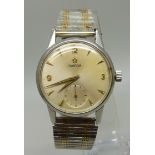 A gentleman's Omega wristwatch with subsidiary second hand, the case back bears inscription dated