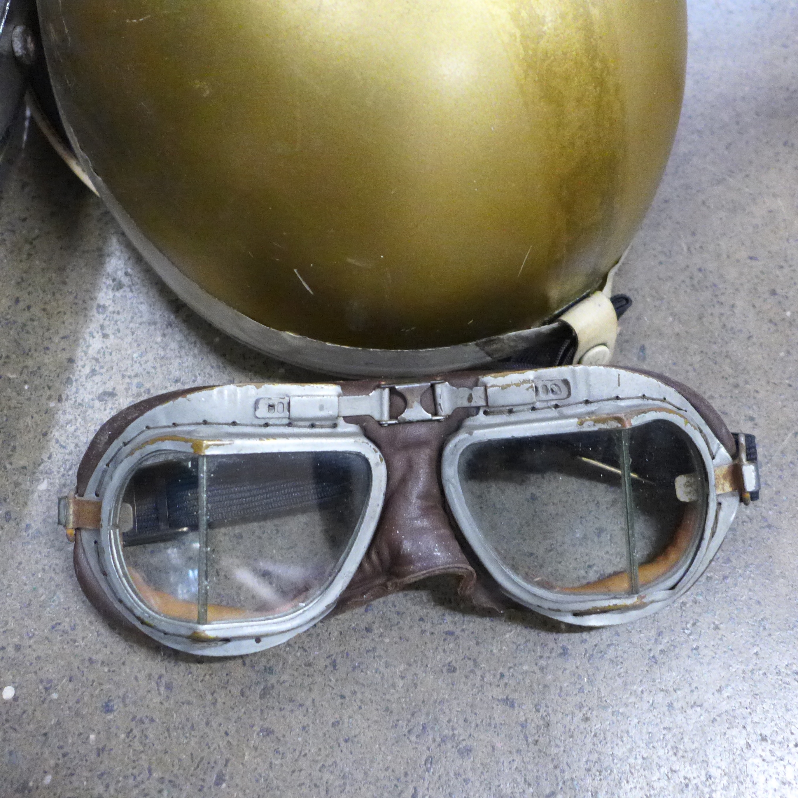 A collection of car parts, Castrol gold helmet, two pairs of driving goggles, steering wheel, rev - Image 9 of 11