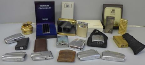 A collection of lighters; Ronson Electronic 30, Ronson Varaflame Comet, vintage Ronson lighter in