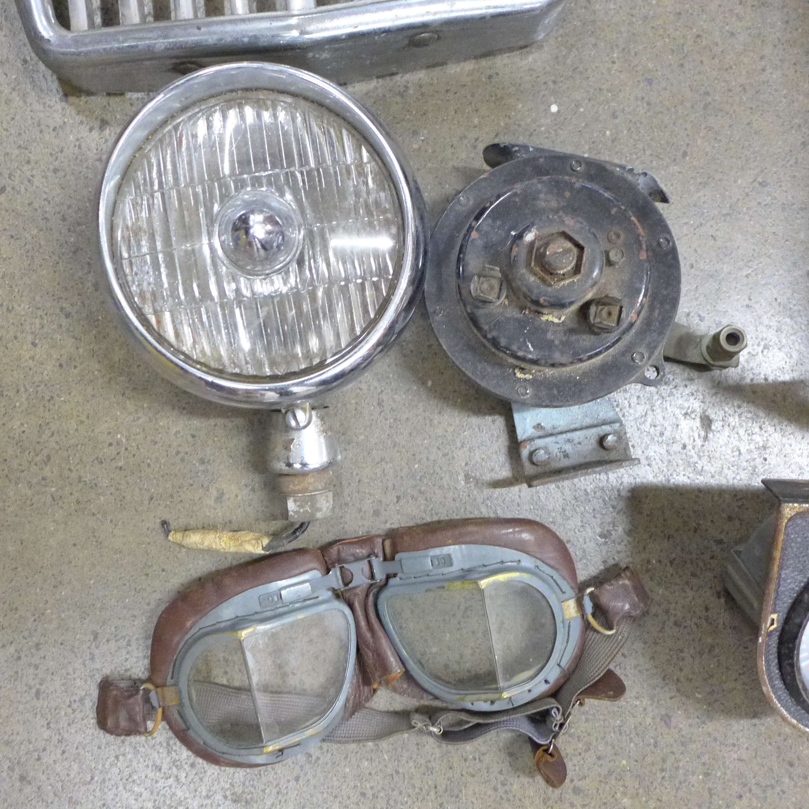 A collection of car parts, Castrol gold helmet, two pairs of driving goggles, steering wheel, rev - Image 3 of 11