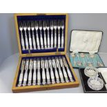 A cased set of 24 silver plate and mother of pearl fish knives and forks, a cased set of six