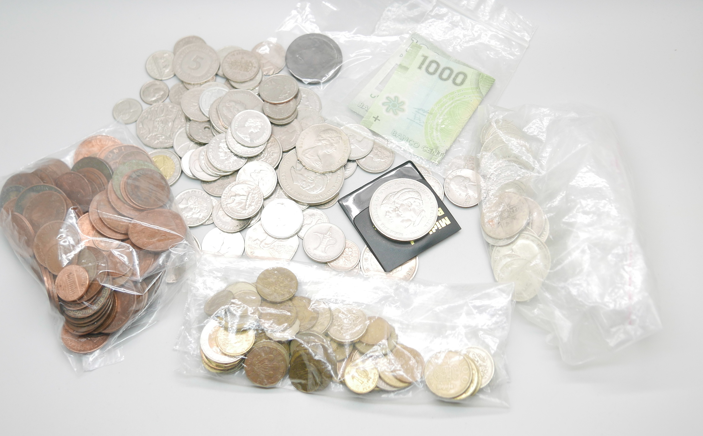 Coins; 188g of 1920 to 1946 half-silver coins, a cartwheel penny, other British and foreign coins