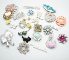 A collection of costume brooches