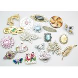 A collection of vintage brooches