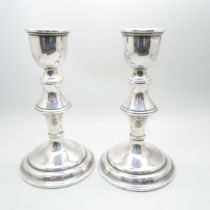 A pair of silver candlesticks, 16.5cm