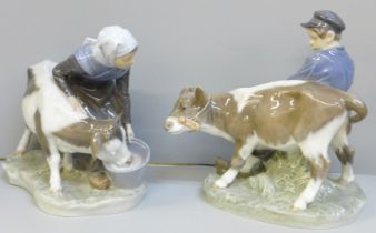 A pair of Royal Copenhagen figures, girl and boy with calves