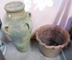 A terracotta planter and a jug