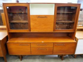 A teak highboard