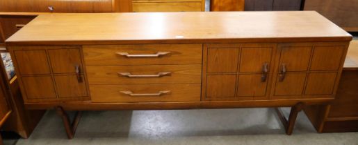 A Beautility teak sideboard