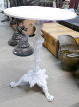 A painted metal garden table