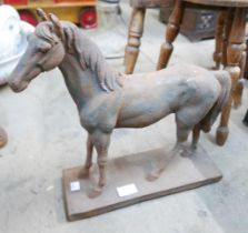 A cast iron figure of a horse