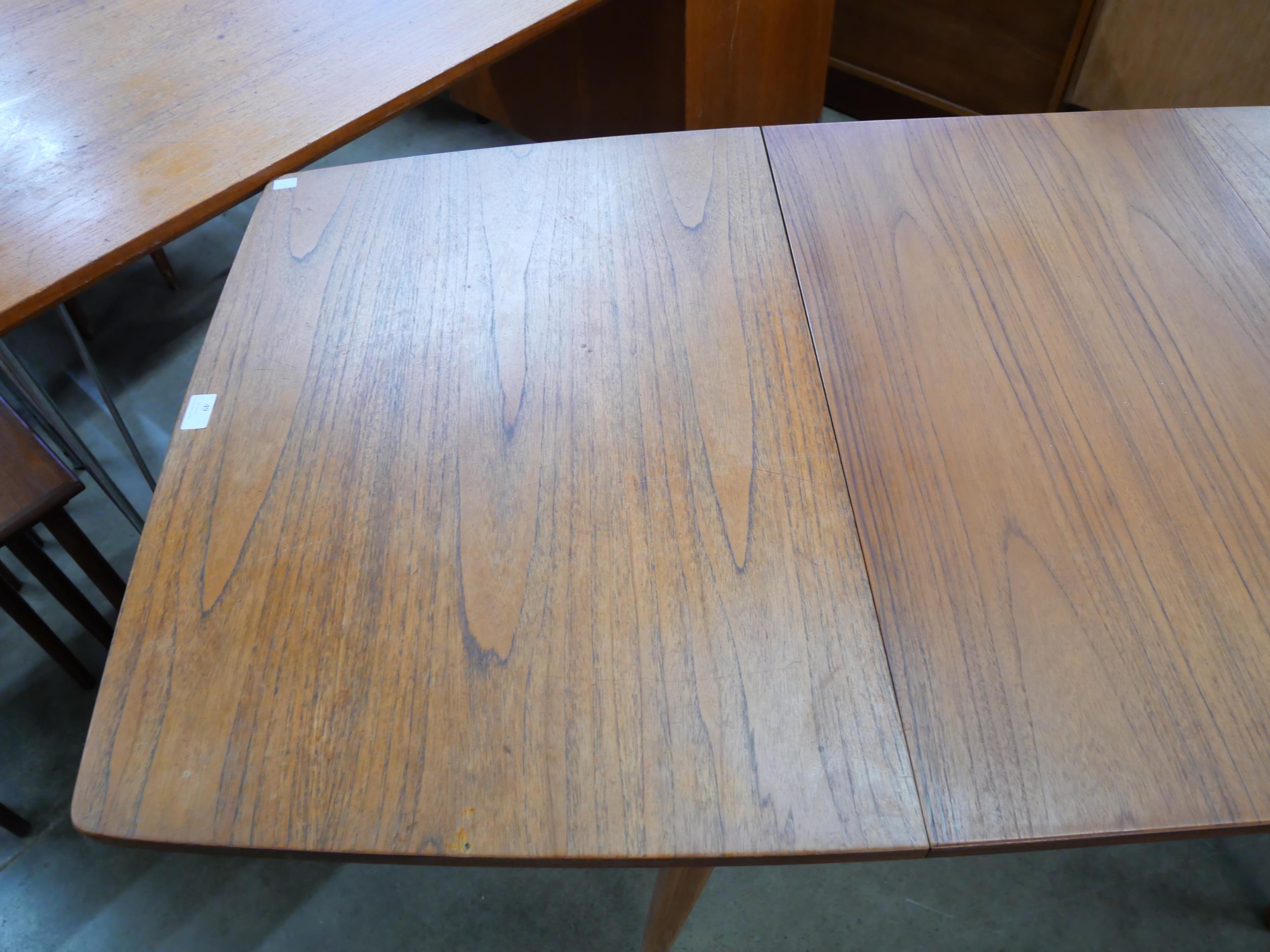 A teak extending dining table - Image 2 of 3