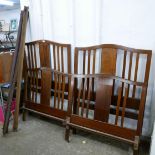 A Victorian beech and inlaid walnut bed frame