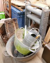 A collection of assorted metalware including a cast iron fire grate, galvanised tubs and a