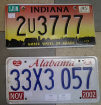 Two American license plates, Alabama and Indiana