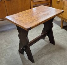 An oak x-frame tavern table