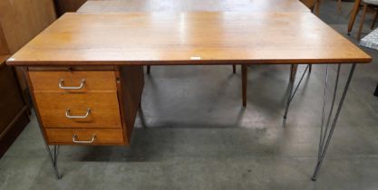 A teak and chrome desk