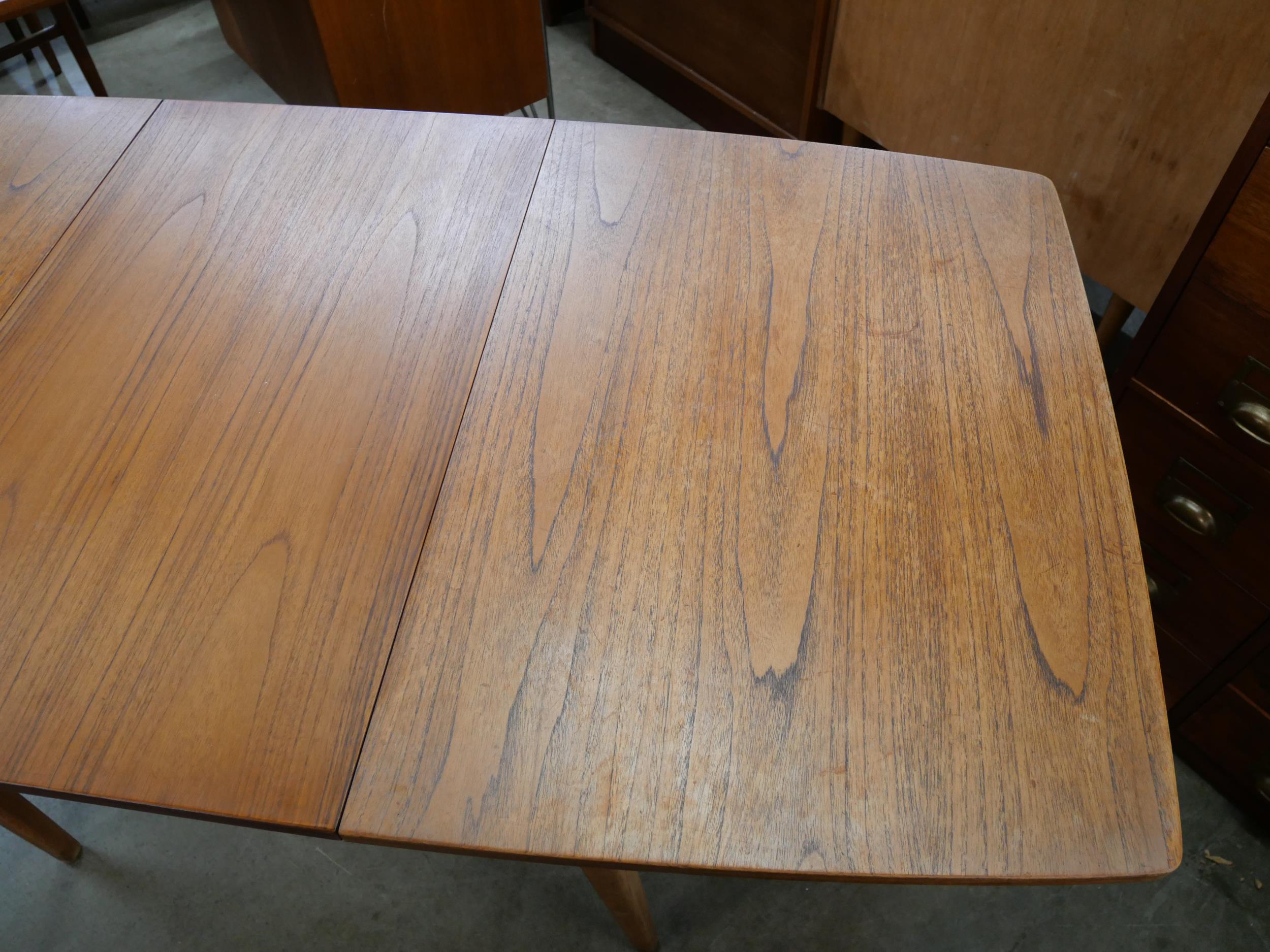 A teak extending dining table - Image 3 of 3