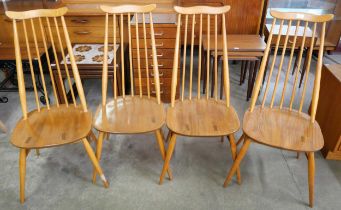 A set of four Ercol Blonde elm and beech Goldsmith chairs