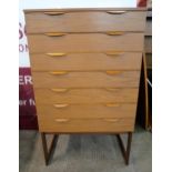 A Europa teak chest of drawers