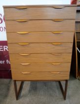 A Europa teak chest of drawers