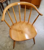 An Ercol Blonde elm and beech 338 model cowhorn chair