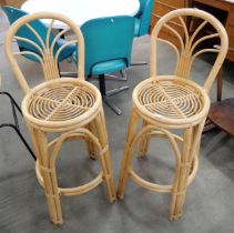 A pair of Italian style bamboo bar stools