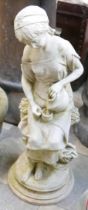 A stone figure of a lady
