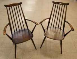A pair of Ercol Golden Dawn elm and beech Goldsmith chairs