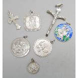 Five silver St. Christopher pendants and two silver crucifix pendants, 25g