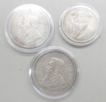 Two South African 1896 2½ shillings coins, one drilled, and an 1897 two shillings coin