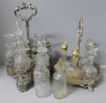 Two plated cruet sets, one six bottle with missing glass bottle and an ornate six bottle cruet set