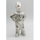 A novelty continental silver pepper modelled as a young Dutch boy, marked HH, possibly Herbert
