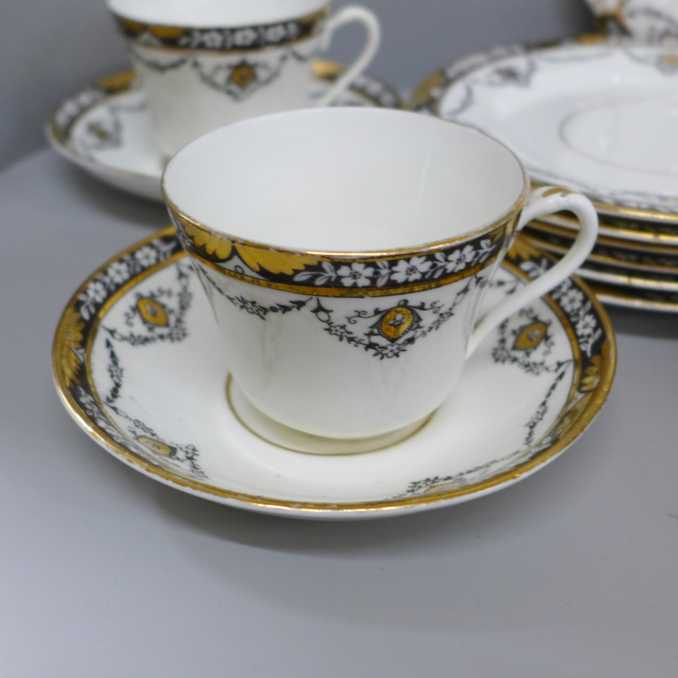 A Beswick & Sons 4494 pattern part tea service comprising cake plate, six side plates and saucers, - Image 2 of 5