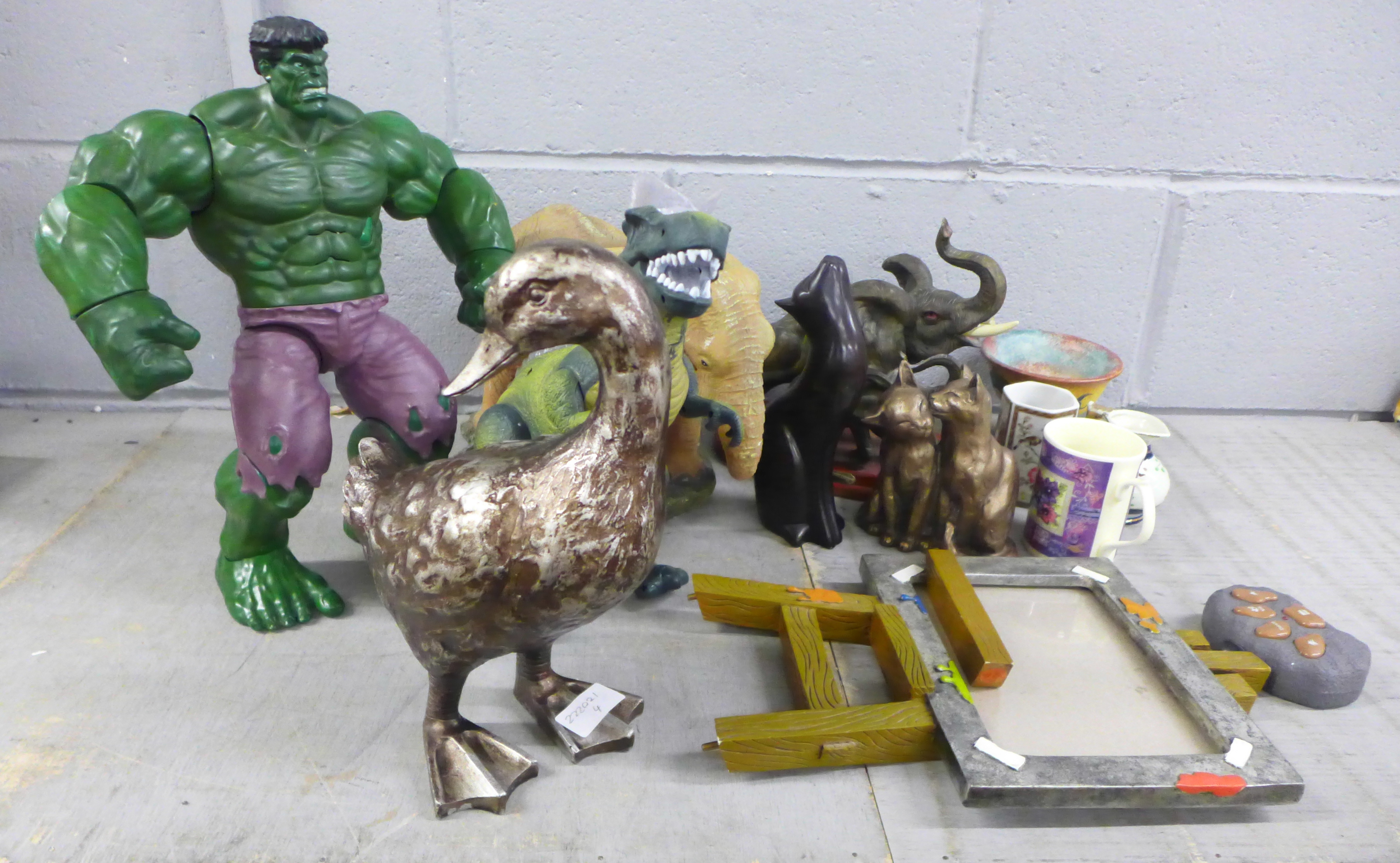 A collection of figures, a toy dinosaur and other ornaments **PLEASE NOTE THIS LOT IS NOT ELIGIBLE