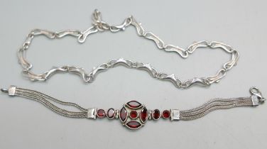 A silver collarette and a silver stone set bracelet