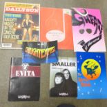 A collection of theatre and concert programmes including Evita, Grease, Pink, etc.