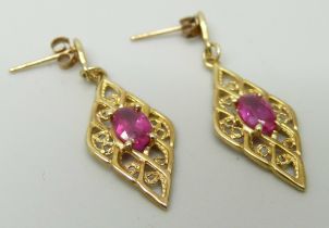 A pair of 9ct gold and ruby drop earrings, 1.7g