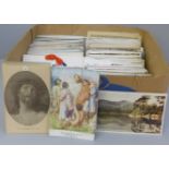 A box containing Edwardian and later postcards, approximately 300