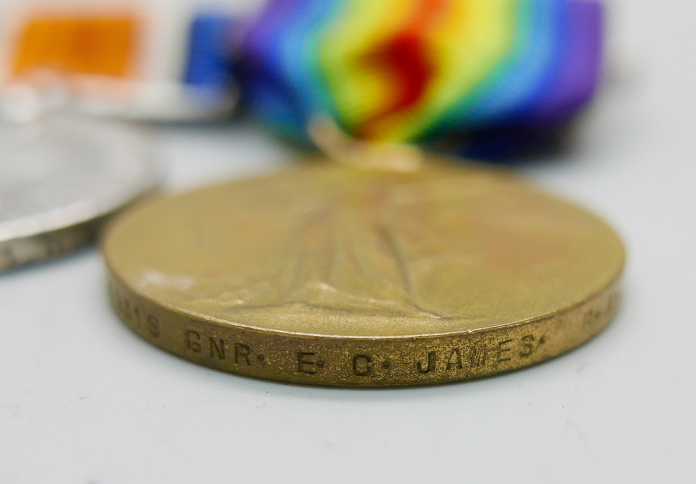 Three WWI medals; Victory medal to 159319 Gnr. E.G. James RA, a British War Medal to K. 1270 J. - Image 4 of 5