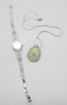 A silver cocktail wristwatch and a silver and marcasite pendant