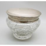 A silver topped cut glass jar, lid 42g, diameter 92mm