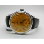 An Omega military style wristwatch with yellow dial, calibre 30T2, same movement in Omega WWII
